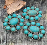 Ornate round rosette 2‑hole beads—antique silver with faux turquoise cabochons. Slide double strand construction; small holes suit fine wire/thread only. Add as focal connectors in bracelet cuffs, stacked chokers, and pendant bars. Popular search terms: turquoise concho beads, round silver focal beads, 2 hole slider beads, jewelry making supplies, components parts. Set of three.