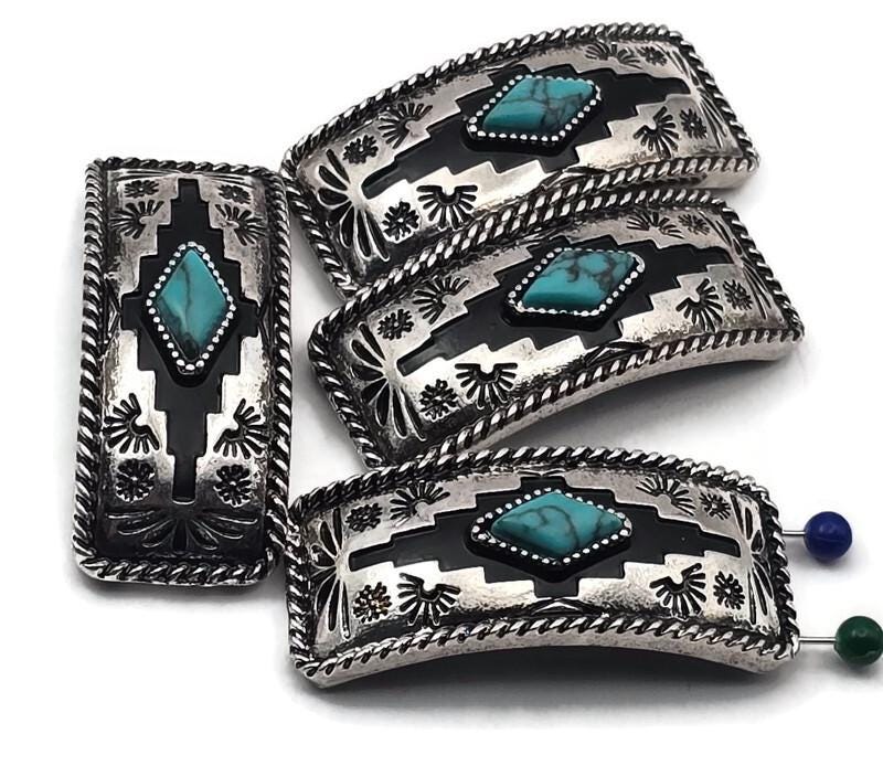 Geometric turquoise bar sliders with black enamel contrast and stamped motifs. Double 2‑strand construction; small holes suit fine thread/wire. Use as statement focal beads, structured spacers, or centerpiece connectors. Bulk wholesale metal components, cheap sliderbeads, online bead shop supplies, artisan silver focal.
