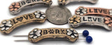 Cute dog bone 2 hole slider beads—mixed metal, oxidized silver, paw print ends. LOVE with bone icon, BARK with paw. Slide double strand connectors for bracelets chokers. Jewelry making components, pet remembrance beads, animal rescue fundraising supplies, bulk wholesale metal, cheap sliderbeads, dog paw focal beads.