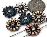 Garden‑inspired flower sliders—rhinestone sparkle, sculpted petals, and patina options. Double‑strand slide components for bracelets, chokers, and anklets. Small holes for fine stringing; not for leather or chain. Search-friendly terms: daisy beads, floral focal beads, rhinestone slider beads, two‑hole beads, jewelry making supplies.