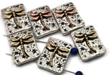 Rectangle dragonfly 2‑hole slider beads with starry sky texture. Antique silver base with warm copper/gold dragonflies. True double‑strand slide design; two small parallel holes keep thin strands aligned—ideal for 0.015–0.018" beading wire, FireLine, or micro cord (not leather/chain). Lightweight focal beads for crafting bracelets, chokers, and horizontal pendants. Nature beads for boho jewelry and giftable DIY kits.