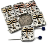 Rectangular 2‑hole beads with raised dragonflies and tiny stars. Double‑strand slide construction for professional, flat‑lay designs. Small‑hole channels suit thin beading wire or braided thread. Ideal focal beads for nature‑inspired bracelets, layered chokers, and giftable DIY kits. Lightweight and comfortable.