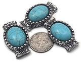 Add a bold Western concho look with these silver metal 2 hole slider beads showcasing faux turquoise stones. The back includes centered guide loops to stabilize strands for clean, professional stringing or bead weaving. Ideal focal beads for bracelets, pendants, earrings, and rings; great paired with seed beads, gemstones, crystals, or tribal metal accents. Unique two hole slide/spacer beads; lead and nickel compliant jewelry findings.