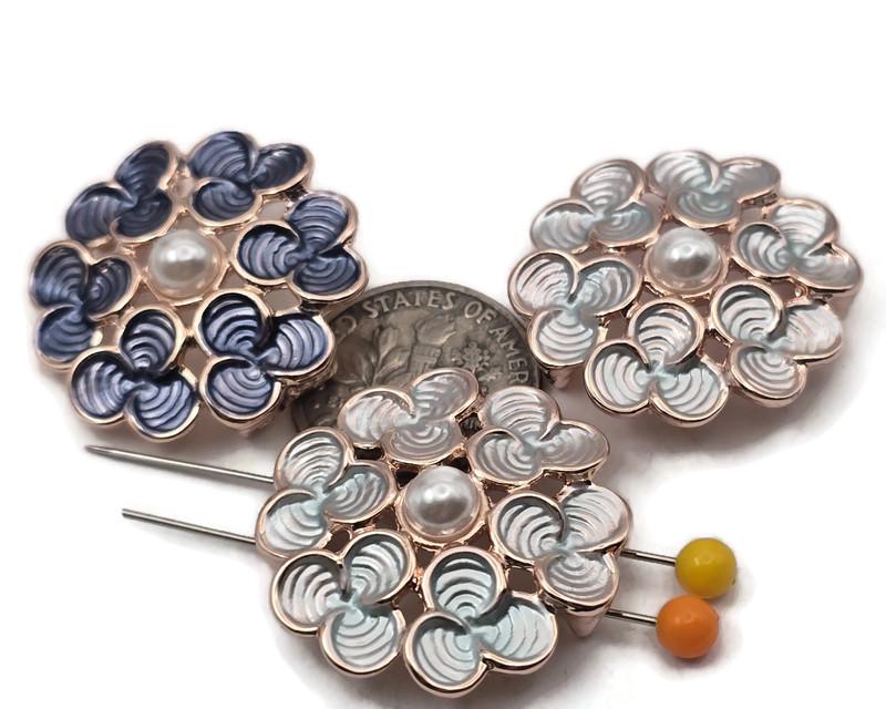 Turn a simple bracelet into a bouquet focal. Center one floral slider and build a band of seed beads to taper into your clasp, or mirror the flower with small gold spacers. For necklaces, treat it like a pendant connector—attach chain or bead‑woven straps at each side and add a tiny drop beneath the pearl. Makes charming earring centers with seed‑bead tassels or delicate chain fringe. Lead and nickel compliant metal beads.