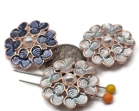 Turn a simple bracelet into a bouquet focal. Center one floral slider and build a band of seed beads to taper into your clasp, or mirror the flower with small gold spacers. For necklaces, treat it like a pendant connector—attach chain or bead‑woven straps at each side and add a tiny drop beneath the pearl. Makes charming earring centers with seed‑bead tassels or delicate chain fringe. Lead and nickel compliant metal beads.