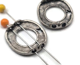 Add personality to your designs with round “Lucky Me” 2 hole slider beads. The soft antique pewter finish pairs with cool grays, blacks, blues, or brights, making them easy components for jewelry making. Build bead‑woven straps that meet the slider, or string simple seed‑bead bands for quick gifts. Works beautifully with gemstone chips, crystals, and other metallic beads. Essential beading supplies, spacer/connector components, and findings for everyday projects.