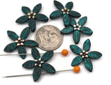 Bring color to your coastal or boho designs with teal flower slider beads. The antiqued patina looks great with amazonite, jasper, howlite, pearls, crystals, and other metallic beads. Use as a connector for bracelets and chokers, or as a focal in earrings. Practical 2 hole spacer/connector components and beading findings for jewelry making, craft shows, and gift sets.