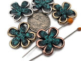These dimensional flower sliders feature marbled teal petals framed by antique silver, gold, or copper outlines. Center one on a bracelet, repeat as a pendant connector, and finish with matching earring drops for a coordinated set. Mix with sea‑glass palettes, crystals, and seed beads as fillers to balance the layout. Practical 2 hole slider beads and jewelry findings for garden, boho, and resort themes.