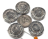 Round spiral 2 hole slider beads deliver artisan texture in seconds. The etched border and raised swirl create a strong focal without extra charms. Ideal for bracelets, anklets, chokers, and necklaces. Combine with matte metallic seed beads, leather cord, or chain for mixed‑media looks. Reliable metal beads, spacer/connector components, and supplies for makers.