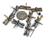 These mixed‑metal dragonfly 2‑hole slider beads add nature’s beauty to your designs. Each bead features raised wing detail and oxidized shadows for depth. Use as double‑strand spacers, bracelet focals, or pendant bar links. Ideal for whimsical, bohemian, or woodland jewelry. Lightweight and comfortable for bracelets, chokers, and anklets.