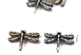 Add a touch of freedom and flight with dragonfly 2‑hole slider beads. Perfect for double‑strand bracelets, chokers, or anklets in cottagecore and bohemian styles. The golden antique finish and engraved wings enhance both natural and gemstone beads. Use as focal beads, slide spacers, or filler charms in your jewelry.