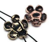 Engraved word flower slider beads with spiraled teal centers bring creativity and heart to every design. These antique silver, copper, and brass mixed‑metal beads are handcrafted for double‑strand applications. Their symbolic message and textured form make them excellent focal beads, spacers, or strand connectors for artisan, inspirational, or spiritual jewelry.