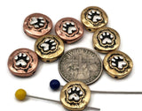 These mixed‑metal paw print 2‑hole slider beads feature raised silver paw designs in antique copper and brass finishes. Perfect for double‑strand bracelets, chokers, or multi‑strand necklaces, they add warmth, contrast, and character to pet‑themed jewelry. Use them as focal beads, spacer bars, or pendant connectors for designs celebrating dog and cat lovers.