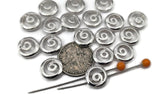 These bright silver swirl 2 hole slider beads make easy pendant connectors and focal links. Use one at the neckline with short beaded sections on each side, then finish with chain for comfort. Add a gemstone drop beneath the spiral for motion. Coordinate with matching bracelet and earring components for a complete set. Practical beading components and jewelry findings for makers.