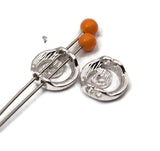 Create polished bracelet stacks using silver swirl 2 hole slider beads. The dual channels keep strands aligned, making them perfect connectors for SuperDuo or seed‑bead straps as well as simple stringing. The bright finish mixes with any palette—turquoise howlite, onyx, hematite, pearls, and glass. Use as a pendant connector and lightweight earring center, too. Lead and nickel compliant metal beads for DIY makers and boutique collections.