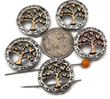 These silver tree of life 2‑hole slider beads deliver symbolism and structure. Use as focal beads on double‑strand bracelets, or string one as a pendant station on layered necklaces. The two holes act like spacer bars to stabilize patterns while the metal finish pairs beautifully with pearls, gemstones, seed beads, and tribal silver beads. Add as slide beads between chip stones, rondelles, or duo beads for balanced, nature‑themed designs.