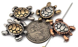 These mixed‑metal sea turtle 2‑hole sliders combine intricate detailing with shiny metallic contrast. Designed for use in double‑strand bracelets and chokers, they sit evenly while adding playful marine character. Ideal for coastal jewelry, surfer styles, and heartfelt keepsakes inspired by the sea, endurance, and harmony.