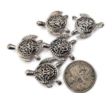 Intricately carved silver turtle 2‑hole slider beads with Celtic‑knot shells combine elegance and symbolism. True double‑hole sliders maintain alignment in bracelets and chokers. Perfect for coastal, Celtic, or bohemian jewelry lines where artistry and meaning meet timeless marine design and polished silver shine.