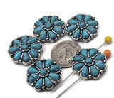 Southwestern daisy 2‑hole slider beads for bracelets and necklaces. Faux turquoise petals sit in an antique silver setting. Slide onto two strands of leather, cord, or beading wire for a centered focal that stays flat. Use as statement metal beads, large spacer beads, or key findings in western jewelry, boot bracelets, and festival chokers.