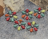 Two-hole Southwestern flower slider beads for bracelets and hatbands. The dual-hole channel keeps designs flat on leather cuffs, peyote strips, and loom bands. Use as focal beads or accent metal beads in layered necklaces. Multicolor turquoise-look petals pop against oxidized silver—perfect for ranch, rodeo, and festival accessories. Essential jewelry findings for DIY makers and boutique lines.