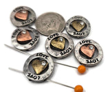 These mixed‑metal heart beads make perfect focal beads or connectors for unique bracelet designs. Crafted in silver‑tone metal, they feature engraved “LOVE” lettering, a raised copper or brass heart, and a sparkling rhinestone accent. The two‑hole design keeps strands aligned and secure. Great for couples’ jewelry, gifts, or artisan accessories—these LOVE beads bring a warm, heartfelt touch to every handmade jewelry project.