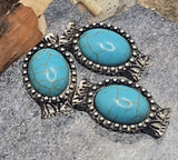 These metal 2 hole slider beads bring Southwestern style to jewelry designs. Each oval concho setting holds a faux turquoise cabochon with rustic dot edging. Parallel holes plus interior guide loops help position strands, making them excellent focal connectors for bracelets and necklaces and striking elements for earrings or wire wrapping. Use as slider, spacer, or centerpiece with seed beads and other beads. Lead and nickel compliant beading components.
