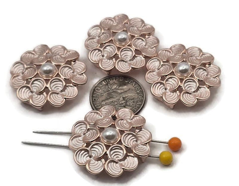 Floral 2 hole slider beads in bright gold metal with soft blush enamel and a pearl‑style center. These metal beads make easy bracelet focals, pendant connectors, and earring centers. Use as slider, spacer, filler, or connector components in jewelry making, beading, and crafting. Pair with seed beads, bugle, gemstone chips, pearls, crystals, Czech glass, and other metallic beads to build balanced designs. Great beading supplies and findings for DIY makers and small wholesale.