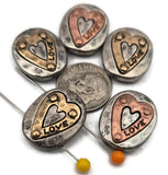 Add warmth to your palette with mixed‑metal “LOVE” slider beads. The light pewter base softens the shine of gold and copper hearts, making these metal beads easy to blend with gemstones, crystals, and seed beads. Use as focal sliders, spacers, or connector beads in bracelets, necklaces, earrings, and keychains. Practical beading components and crafting supplies for DIY and small‑batch wholesale.