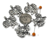 Create coordinated sets quickly with turtle 2 hole slider beads in bright silver metal. Center one in a bracelet and taper seed beads toward the clasp, repeat as a pendant connector on a necklace, then finish with simple drop earrings. Pair with pearls, shell beads, amazonite, aquamarine, or Czech glass for seaside sparkle. Versatile spacer/connector components for jewelry making, beading, and crafting supplies—great for gifts and small wholesale packs.