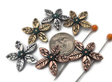 These metal flower 2 hole slider beads bring organic texture to bracelets and necklaces. Use as a focal slider, slide spacer, or connector component; add seed beads, bugle, pearls, crystals, or gemstone chips as space fillers to complete your layout. The teal center adds a pop of color that pairs beautifully with aqua, blush, and neutral palettes. Reliable beading findings for makers who love floral beads and mixed‑metal supplies.