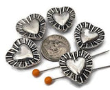Create coordinated sets quickly with silver heart 2 hole sliders. Center one on a bracelet, repeat as a pendant connector, and finish with simple drop earrings. Combine with Czech glass, gemstone chips, and other metallic beads for texture. Practical spacer/connector components and jewelry findings for DIY kits, party favors, and craft‑fair displays.