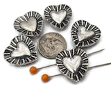 Silver heart 2 hole slider beads with a dimensional center and textured sunburst border. Use these metal beads as focal sliders, spacers, or connector components in bracelet stacks, chokers, and necklaces. Frame with seed beads as filler beads, then add crystals, pearls, or Czech glass for shimmer. Romantic beading components and findings for gifts, bridesmaid sets, friendship jewelry, and small‑batch wholesale. Lead and nickel compliant jewelry making supplies.