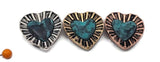 Statement hearts made simple. Mixed‑metal 2 hole slider beads feature dimensional turquoise centers and ridged halos that catch the light. Use as focal sliders, spacers, or connector beads in bracelets, chokers, necklaces, and earrings. Combine with seed beads as fillers, matte metallic rounds, or Czech glass for texture. Essential metal beads and jewelry making components for boho, Southwestern, and festival styles.