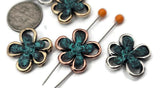 Floral 2 hole slider beads with open petals and turquoise patina centers deliver instant artisan charm. Use as spacers, connectors, or focal beads in bracelets, chokers, and necklaces. The mixed‑metal finish blends easily with other metallic beads, heishi, gemstones, and Czech glass. Great for spring bridesmaid gifts, Mother’s Day jewelry, and everyday stacks. Lead and nickel compliant metal components for makers.