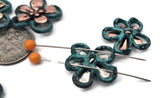 Mixed‑metal flower sliders make coordinated sets simple. The open petal design keeps pieces light while the dual holes provide a stable connector. Combine with sea‑glass colors, matte metallic seed beads, and gemstone chips; finish with chain for comfort. Essential 2 hole slider beads, spacer/connector components, and findings for DIY kits, party favors, and boutique collections.