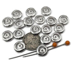 Minimalist round 2 hole slider beads featuring a cutout swirl that symbolizes energy and growth. Ideal for unisex bracelets, anklets, chokers, and necklaces. Frame with seed beads as filler beads, add hematite or lava stone for earthy texture, or lighten the look with pearls and clear crystal. Essential spacer/connector components and beading supplies for travel souvenirs, yoga jewelry, and festival style.