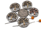 Silver tone eternal life tree 2‑hole slider beads are beautiful and practical. The dual‑hole path functions as a spacer bar, keeping multi‑strand bracelets and necklace pendants aligned. Use these tree beads as focal beads, then fill the pattern with pearls, seed beads, gemstones, chip stones, or tribal silver beads. They blend seamlessly with duo beads and other metal beads, making them an easy, symbolic upgrade for boho and spiritual jewelry.