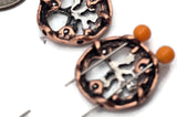 These round Tree of Life slider beads deliver a timeless message of growth and connection. The silver tree pops against heart‑pattern rims in warm gold and copper. Two holes function as a spacer bar for secure multi‑strand alignment. Ideal with filler beads—pearls, gemstones, seed beads, chips, tribal silver—and duo beads for structured spacing. Perfect as focal beads for bracelets or pendants in artisan, boho, and spiritual jewelry.