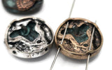 Create unique statement pieces with these eye‑catching metal 2‑hole focal beads. Featuring a mix of silver, gold, antique copper, and patina finishes, each bead is adorned with an intricate floral design. These double‑hole slider beads are excellent for adding a distinctive touch to your boho bracelets or as central elements in artisan necklaces, providing both beauty and structural integrity.