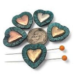 These heart‑shaped 2‑hole slider beads make sweet focal beads for bracelets, anklets, and necklace pendants. Two parallel channels stabilize leather cuffs and bead‑woven paths so the heart stays centered. Surround with seed beads, fire‑polished Czech beads, crystal bicones, heishi, and pearls for layered romance. Great bracelet beads, necklace beads, and wide spacer beads for Valentine's Day, weddings, and heartfelt gifts—essential findings for any beading stash.