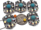 These Southwestern 2 hole slider beads feature a turquoise‑style center cabochon framed by sparkling AB rhinestones in an ornate silver setting. Perfect as focal beads for bracelets and chokers, the double‑hole design keeps two strands of leather, cord, or beading wire perfectly aligned. Pair with seed beads, Czech beads, and gemstone chips for a vibrant boho look. Durable jewelry making components and bracelet beads that add instant Western flair.