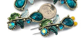Add stunning sparkle with these blue zircon AB 2‑hole slider beads featuring teardrop stones and rhinestone accents. Designed with two parallel holes, these metal beads stay centered on leather, paracord, or bead‑woven bands. Use as focal beads or wide spacer beads with seed beads, Czech glass, heishi, and crystal accents. Ideal bracelet beads and necklace beads for elegant jewelry, special occasions, and statement accessories.