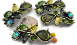 These ornate olivine 2‑hole slider beads are perfect focal beads for statement bracelets and chokers. The large teardrop stones with AB coating, green rhinestones, and antique brass leaf details create visual interest on leather, cord, or beading wire. Use with seed beads, Miyuki Delicas, Czech beads, or heishi for texture. Versatile bracelet beads and jewelry making components for boho, vintage‑style, and artistic beading designs.
