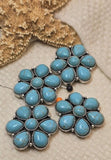 Create authentic Western jewelry with these turquoise floral cluster 2 hole slider beads. Each bead features multiple turquoise‑style stones in an ornate silver‑tone setting with two parallel holes for a no‑twist fit. Pair with seed beads, Czech fire‑polish, heishi, and gemstone chips for high‑impact stacks. Essential bracelet beads and beading components for Southwestern, rodeo, and festival jewelry.