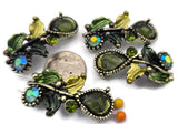 These olivine 2 hole slider beads make striking focal beads for bracelets and necklaces. Featuring large teardrop stones with AB coating and sparkling green rhinestones, the double‑hole construction prevents twisting and keeps the bead facing forward. Mix with seed beads, Czech beads, or pearls for layered designs. Perfect bracelet beads, spacer beads, and jewelry making components for boho, vintage, and nature‑themed collections.