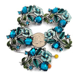 Add stunning sparkle with these blue zircon cube 2‑hole slider beads featuring faceted stones and enamel leaf accents. Designed with two parallel holes, these metal beads stay centered on leather, paracord, or bead‑woven bands. Use as focal beads or wide spacer beads with seed beads, Czech glass, heishi, and crystal accents. Ideal bracelet beads and necklace beads for elegant jewelry, special occasions, and statement accessories.
