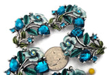 These blue zircon 2 hole slider beads make striking focal beads for bracelets and necklaces. Featuring large faceted cube stones with smaller blue zircon rhinestones and colorful enamel leaves, the double‑hole construction prevents twisting and keeps the bead facing forward. Mix with seed beads, Czech beads, or pearls for layered designs. Perfect bracelet beads, spacer beads, and jewelry making components for boho, elegant, and glamorous collections.