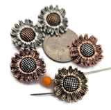 Bring sunshine to your jewelry line with these dimensional sunflower 2‑hole slider beads in mixed metals. Each flower features sculpted petals and a dotted seed center that photographs beautifully. The dual‑hole construction functions as a spacer bar, keeping strands aligned in bracelets and necklaces. Use as focal beads, slide beads, or repeating tiles with seed beads, gemstones, pearls, and tribal silver for boho, rustic, and cottage‑inspired collections.
