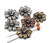 Create heartfelt designs with these inspirational flower slider beads. These 2‑hole metal beads feature engraved petals with positive messages and a shimmering rhinestone focal. Available in mixed silver, gold, and copper tones, they serve as excellent connectors for double‑strand bracelets and necklaces. Pair with seed beads, crystals, or gemstone strands to craft unique, artisan jewelry. Essential findings for beading, crafting, and personalized jewelry making.