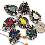 Colorful mosaic 2 hole slider beads with teardrop centerpiece and antique silver detailing. These metal slide spacer beads are designed for two strand double bracelet necklace jewelry making and sit beautifully between seed beads, duo beads, gemstone beads, or metal spacer beads. Perfect for bohemian jewelry designs, festival bracelets, western inspired accessories, and creative DIY beading projects.